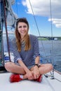 Attractive girl sailing on a yacht, in summer day. Royalty Free Stock Photo