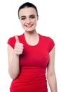 Attractive girl showing thumbs up Royalty Free Stock Photo