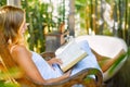 Woman relaxing in open air bathroom Royalty Free Stock Photo