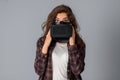 Attractive girl testing virtual reality glasses Royalty Free Stock Photo