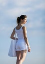 Attractive girl with white bag on open air Royalty Free Stock Photo