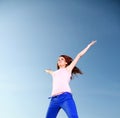 Attractive girl Young woman jumping sky Royalty Free Stock Photo