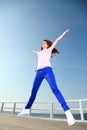 Attractive girl Young woman jumping sky Royalty Free Stock Photo