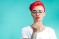 Attractive glamour girl looking at the stick of candy Royalty Free Stock Photo