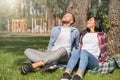 Attractive guy and beautiful young girl romantic pastime. Handsome man and attractive girl on a date. Summer Love story. Royalty Free Stock Photo