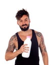 Attractive guy holding a milk bottle Royalty Free Stock Photo