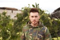 Attractive guy with military jacket Royalty Free Stock Photo