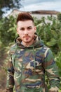 Attractive guy with military jacket Royalty Free Stock Photo