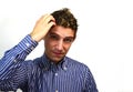 Attractive guy scratching his head Royalty Free Stock Photo