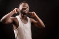 Attractive guy trying new earpieces. being keen on music Royalty Free Stock Photo