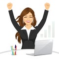 Attractive happy businesswoman celebrating