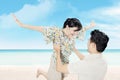 Attractive happy couple have fun on beach Royalty Free Stock Photo