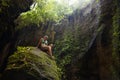 Attractive and happy mid adult woman with grey hair 40s or 50s enjoying blissful and free at beautiful green tropical forest Royalty Free Stock Photo