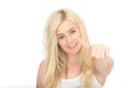 Attractive Happy Positive Young Woman Looking Pleased Giving a Thumbs Up Royalty Free Stock Photo