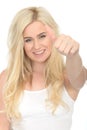 Attractive Happy Positive Young Woman Looking Pleased Giving a Thumbs Up Royalty Free Stock Photo