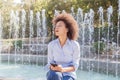 Attractive Happy Young African American Woman Listening Music Earphones Royalty Free Stock Photo