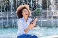 Attractive Happy Young African American Woman Listening Music Earphones Royalty Free Stock Photo