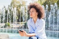 Attractive Happy Young African American Woman Listening Music Earphones Royalty Free Stock Photo