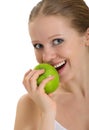Attractive healthy girl biting an apple isolated
