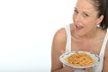 Attractive Healthy Happy Natural Young Woman Holding a Plate of Spaghetti Bolognese