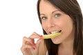 Attractive Healthy Happy Young Woman Eating a Slice of Fresh Melon Royalty Free Stock Photo