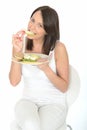 Attractive Healthy Young Woman Eating a Plate of Norwegian Style Breakfast Royalty Free Stock Photo