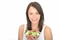 Attractive Healthy Young Woman Holding a Plate of Fresh Chicken Salad Royalty Free Stock Photo