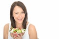 Attractive Healthy Young Woman Holding a Plate of Fresh Chicken Salad Royalty Free Stock Photo