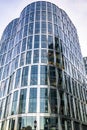 Attractive high-rise building made of glass with curved semi-circular shapes imitating the sea wave in Boston