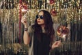 Attractive hipster girl holding sparklers in hands Royalty Free Stock Photo