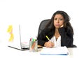 Attractive hispanic businesswoman or secretary suffering breakdown and headache in stress at office Royalty Free Stock Photo