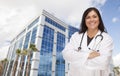 Attractive Hispanic Doctor or Nurse in Front of Building Royalty Free Stock Photo