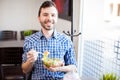 Attractive Hispanic man eating healthy food Royalty Free Stock Photo