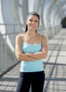 Attractive hispanic woman happy smiling cheerful on urban metal city bridge