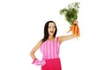 Attractive housewife holds bunch of carrots Royalty Free Stock Photo