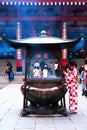 Attractive Japanese Girl wearing kimono at Asakusa Temple, Tokyo, Japan. 25th February. 2021