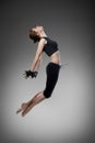 Attractive jumping woman dancer Royalty Free Stock Photo