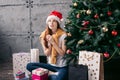 Attractive kind girl wishing everyone merry christmas. Royalty Free Stock Photo