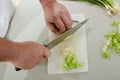 Attractive latin american man cooking Royalty Free Stock Photo