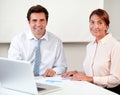 Attractive latin colleagues smiling at you Royalty Free Stock Photo