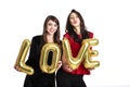 Same sex love concept. Two beautiful females women girls from lgbt community with long gorgeous hair on February 14th Happy valent Royalty Free Stock Photo