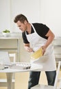 Attractive male with mixing bowl