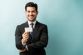 Attractive Male Professional With Placard In Studio Royalty Free Stock Photo