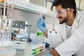 Attractive student of chemistry working in lab Royalty Free Stock Photo