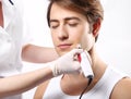 Attractive man in a beauty salon, micro needle mesotherapy treatment Royalty Free Stock Photo