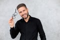 Attractive man dressed casual, wearing glasses - studio shot, copy space