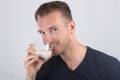 Attractive man drinking milk Royalty Free Stock Photo