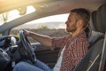 Attractive man driving a car. Royalty Free Stock Photo