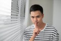 Attractive man with finger on lips making silence gesture. Shh Royalty Free Stock Photo