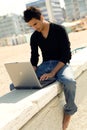 Attractive man with laptop Royalty Free Stock Photo